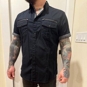 Proper shirt for a classy boxer out for a night on the town.  Black casual shirt